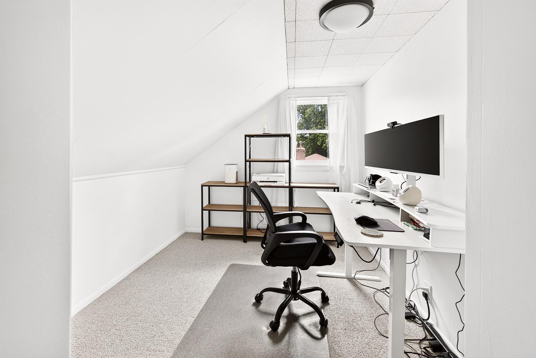 4th bedroom in upper level is currently being used as an office