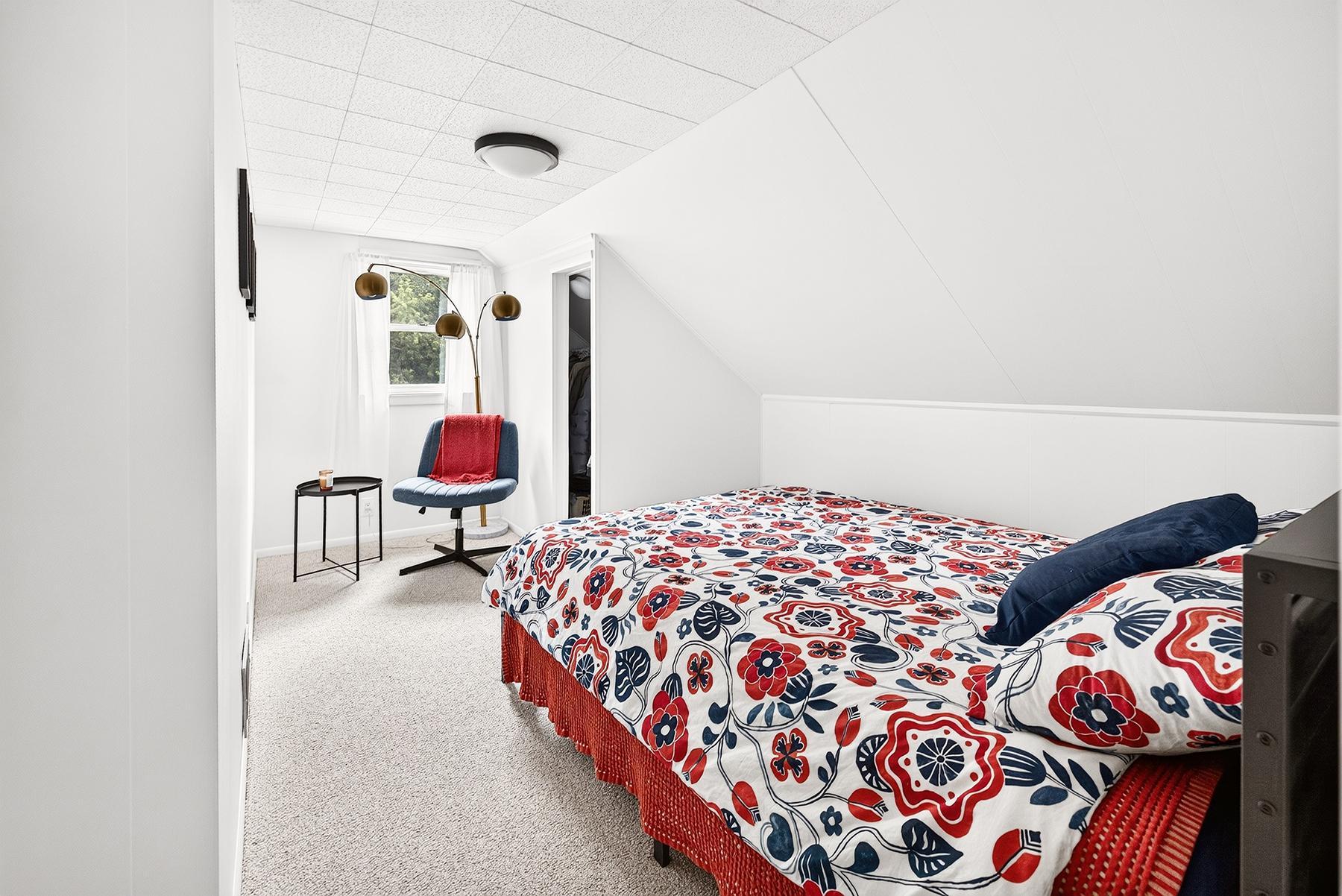 3rd bedroom on upper level is ideal for guests, hobbies, or office space
