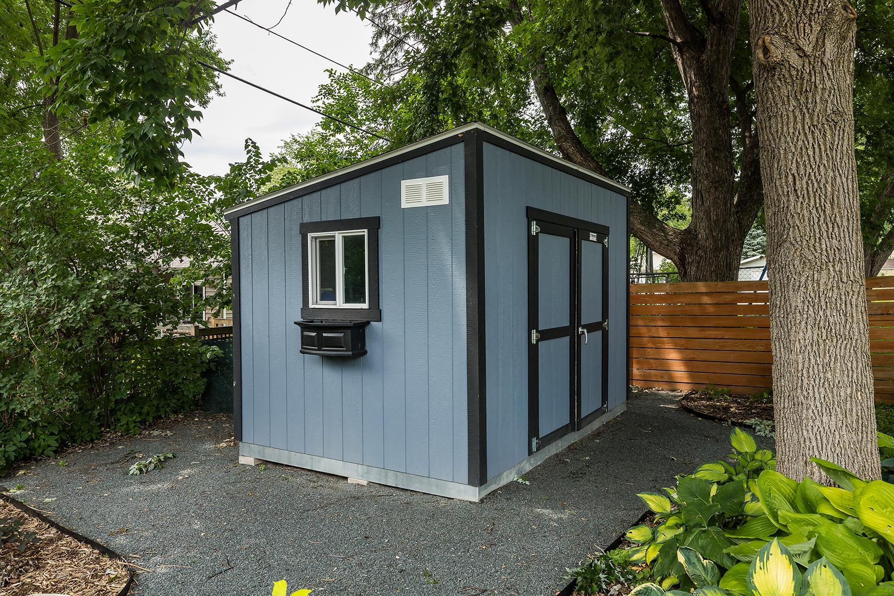 Storage shed in back yard offers great extra storage