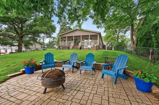 The lakeside firepit and patio creates the perfect setting for gathering with family and friends.