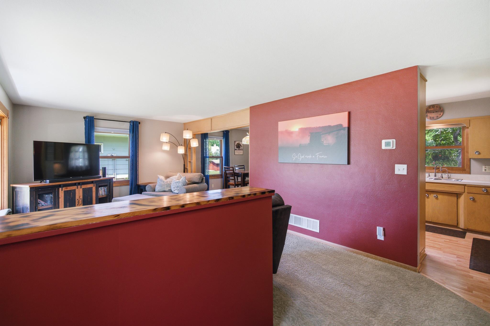 Enjoy relaxing in the welcoming living room with a beautiful picture window and plenty of space to gather.