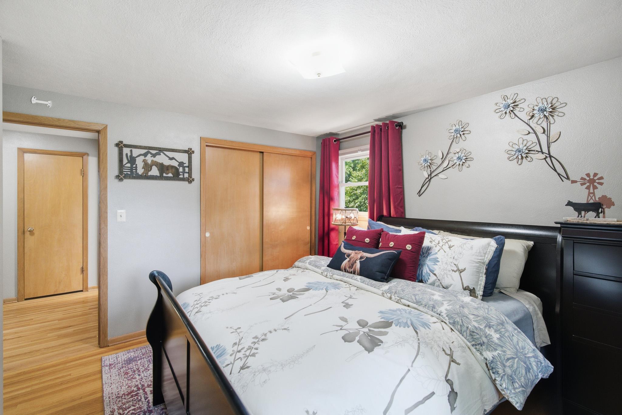 Light filled bedroom offers hardwood floors and a peaceful retreat at the end of the day.