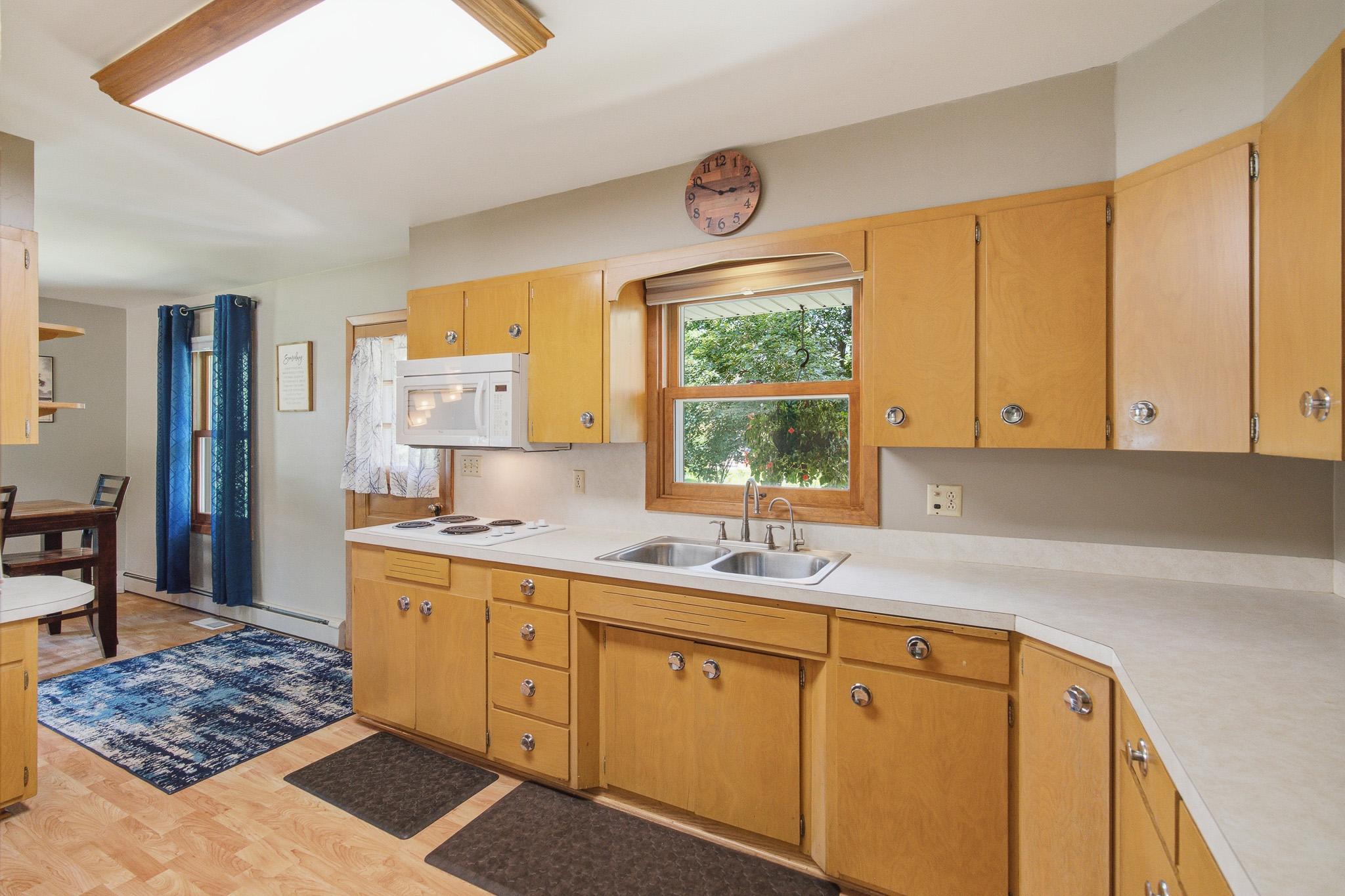 Bright kitchen with plenty of cabinet storage and an efficient layout for everyday cooking.
