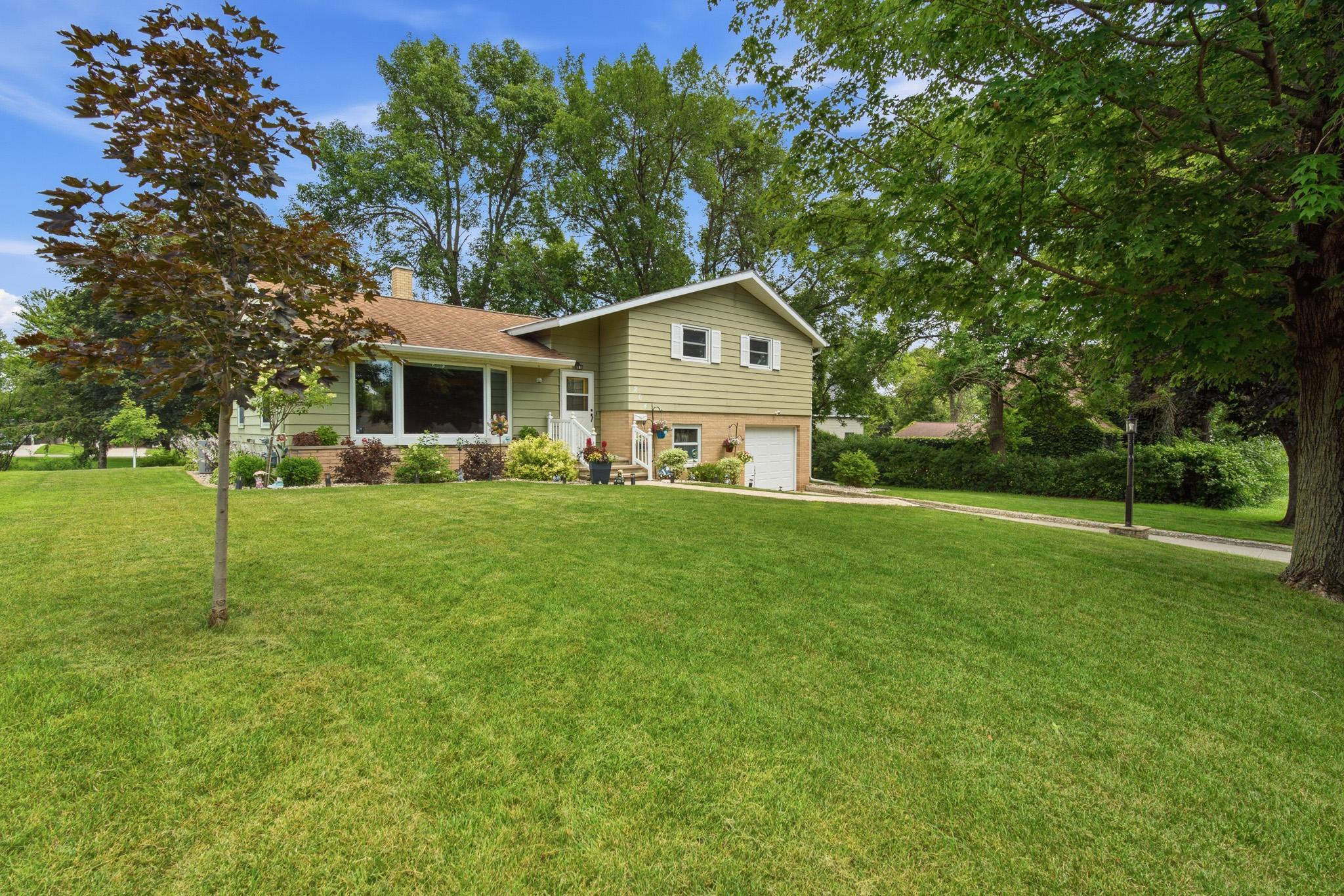 Charming 3 bedroom home featuring a beautifully landscaped yard, spacious layout, and move in ready condition.