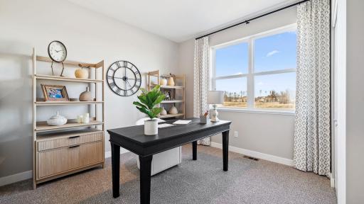 The Jordan's 5th bedroom and a 3/4 bath are located on the main floor! Extra bonus for visitors on an extended stay. Photo of model, colors and finishes may vary.