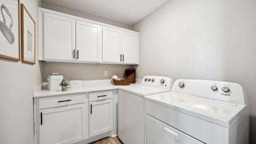Upper level laundry room come with cabinets! Photo of model, colors and finishes may vary.