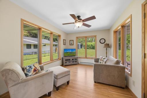 A beautiful 4-season sun room addition overlooking your generous yard