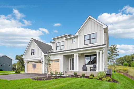 LP Smartside siding around all 4-sides and Andersen Fibrex windows