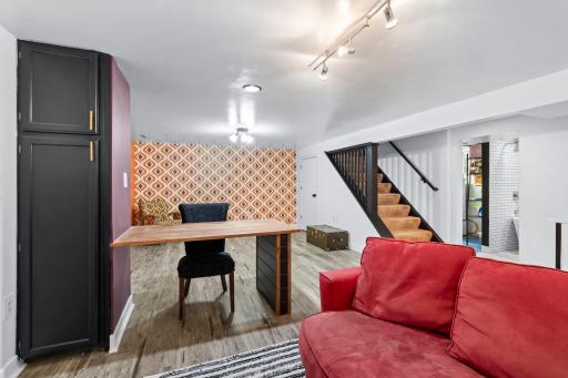 Lower level with space for work, hobbies, or entertaining