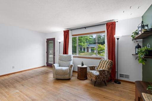 Large picture window brings abundant natural light into the living room