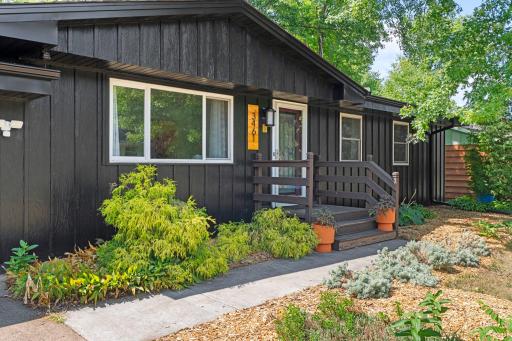 Inviting front entry with landscaped walkway