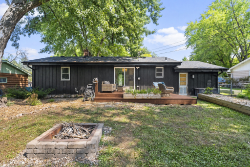 A private feeling backyard with room to garden, gather, and relax