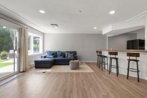 Perfect for entertaining, this space offers easy indoor-outdoor living with direct access to the pool and patio area