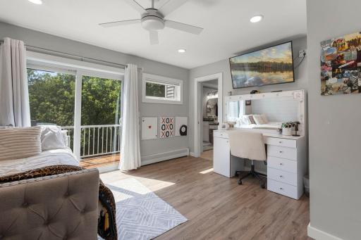 Upper level offers 2 bedrooms, including one with a private balcony - both could be a great option for the primary bedroom
