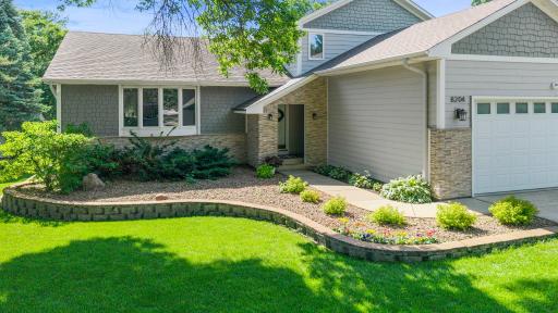 Wonderful landscaping complements the home