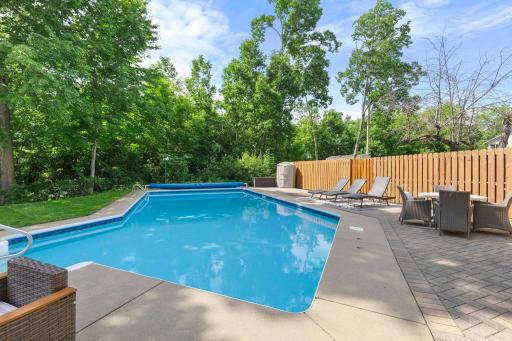 Relax by the refreshing in-ground pool on those hot summer days