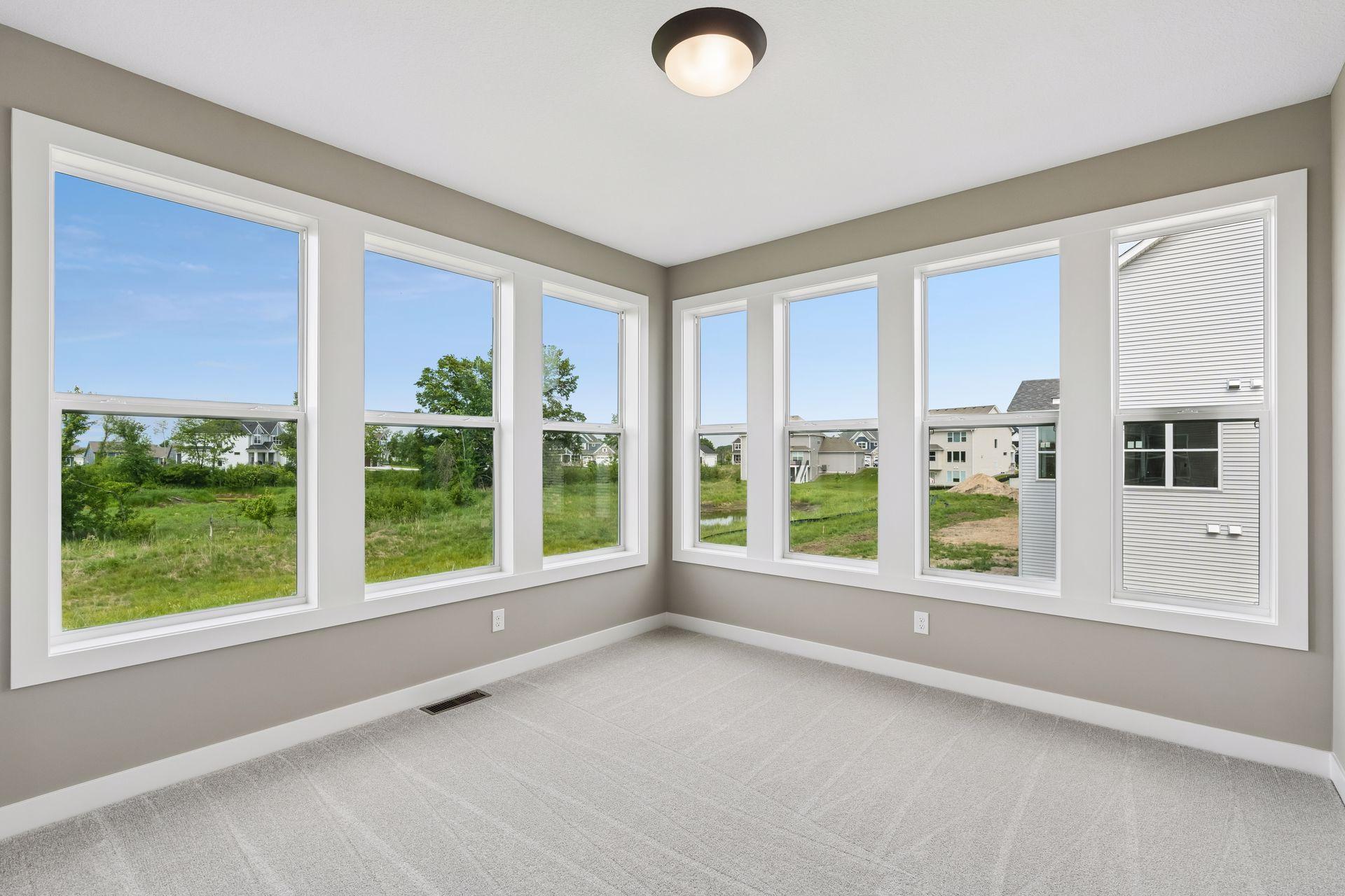 Just off the kitchen is the sun room. Use it as a reading nook or a place for your kids to play.