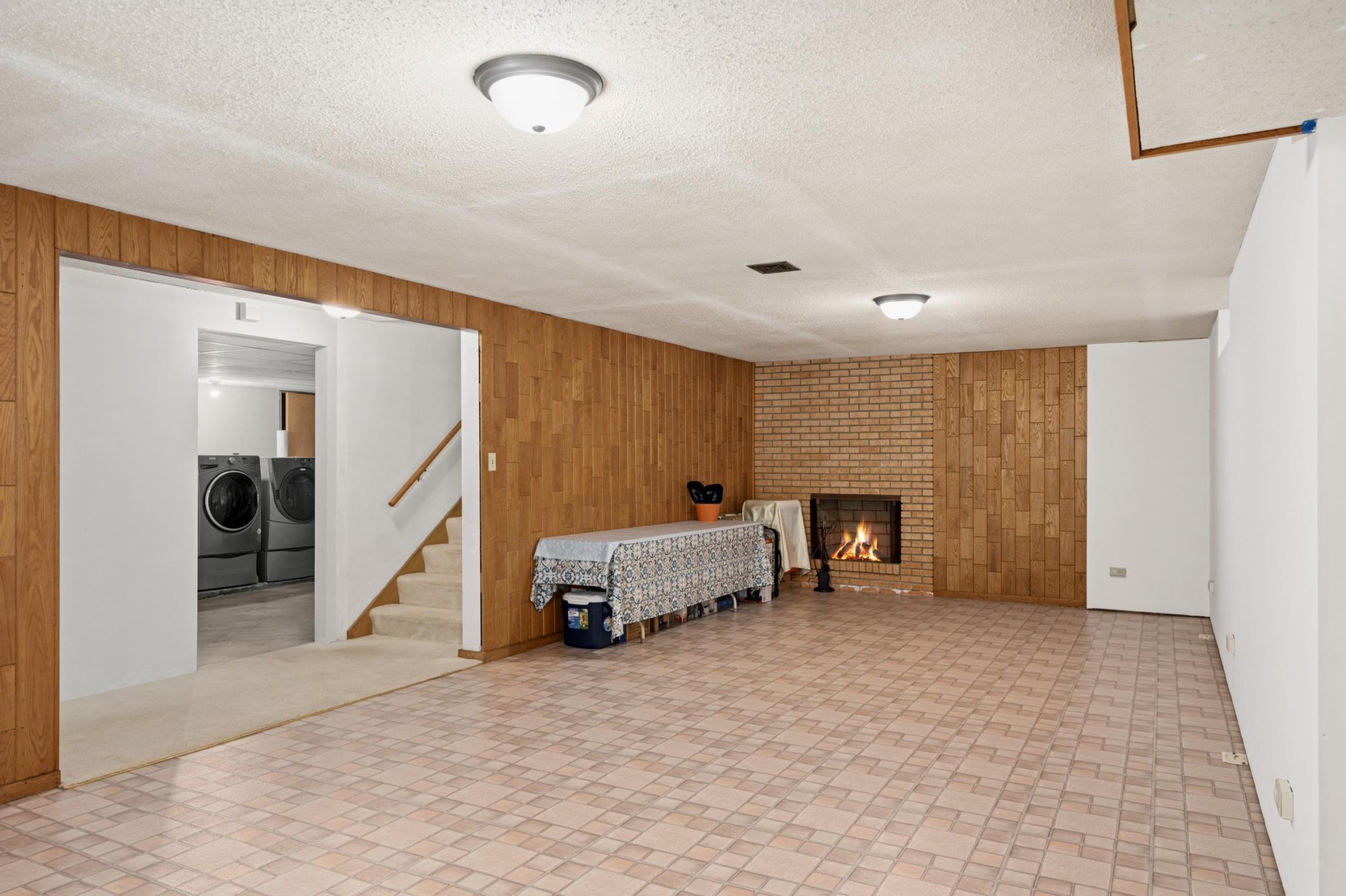 Lower Level Family Room with Fireplace