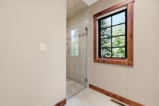 Main bath tiled walk in shower
