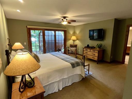 Main suite with doors out to the lake and your sauna!