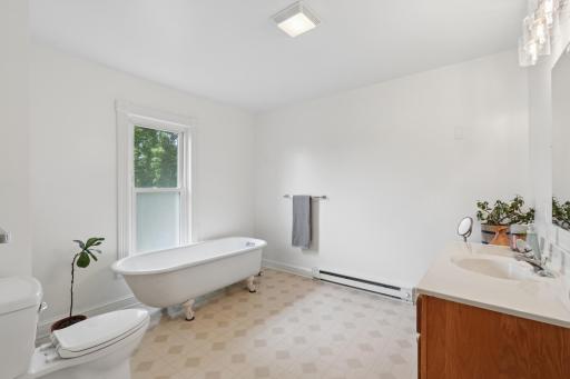 Upper level bathroom with original claw foot tub