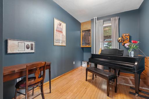 2nd main floor bedroom being used as a piano room