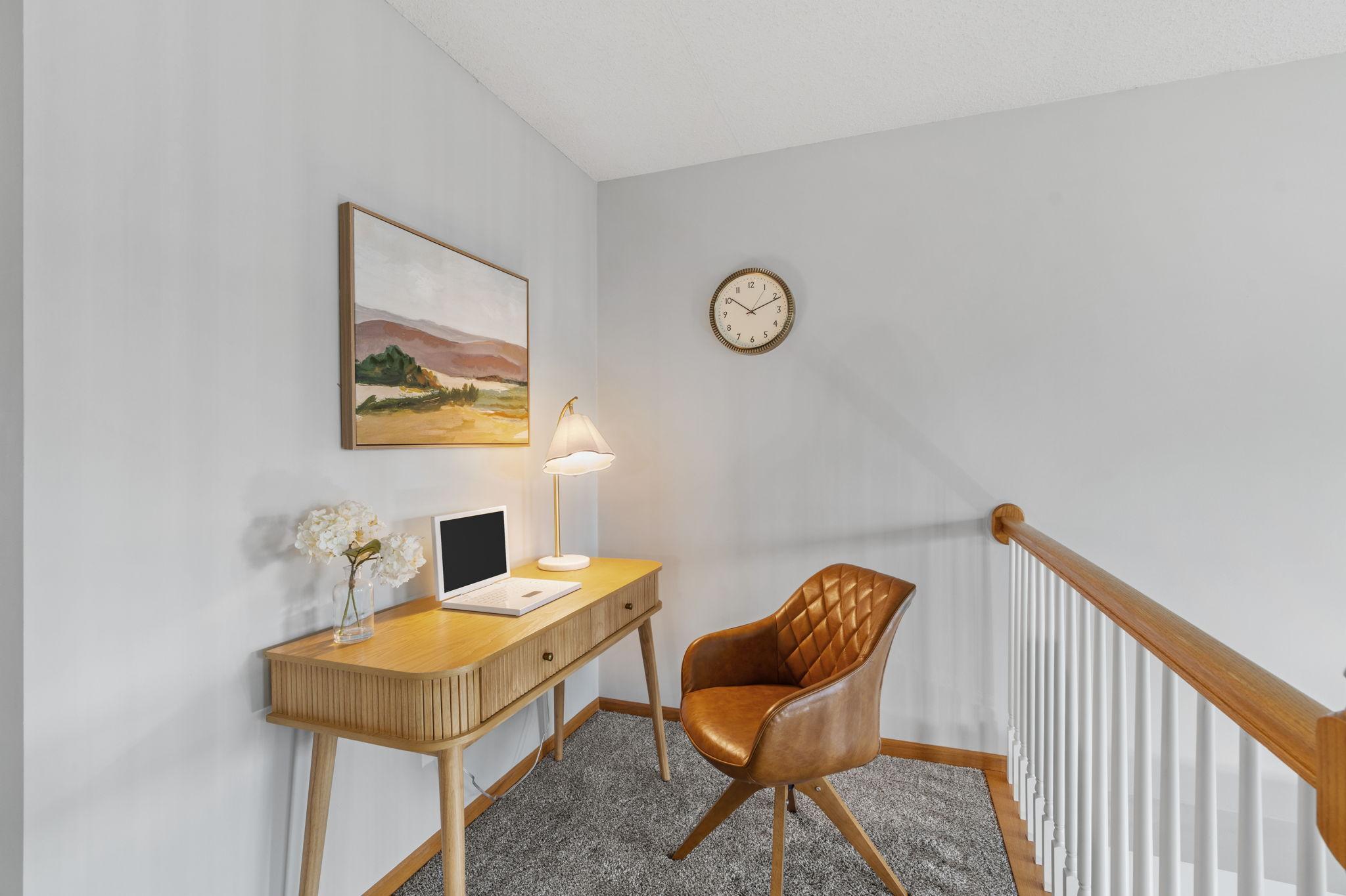 Cute loft space for an office or reading nook!