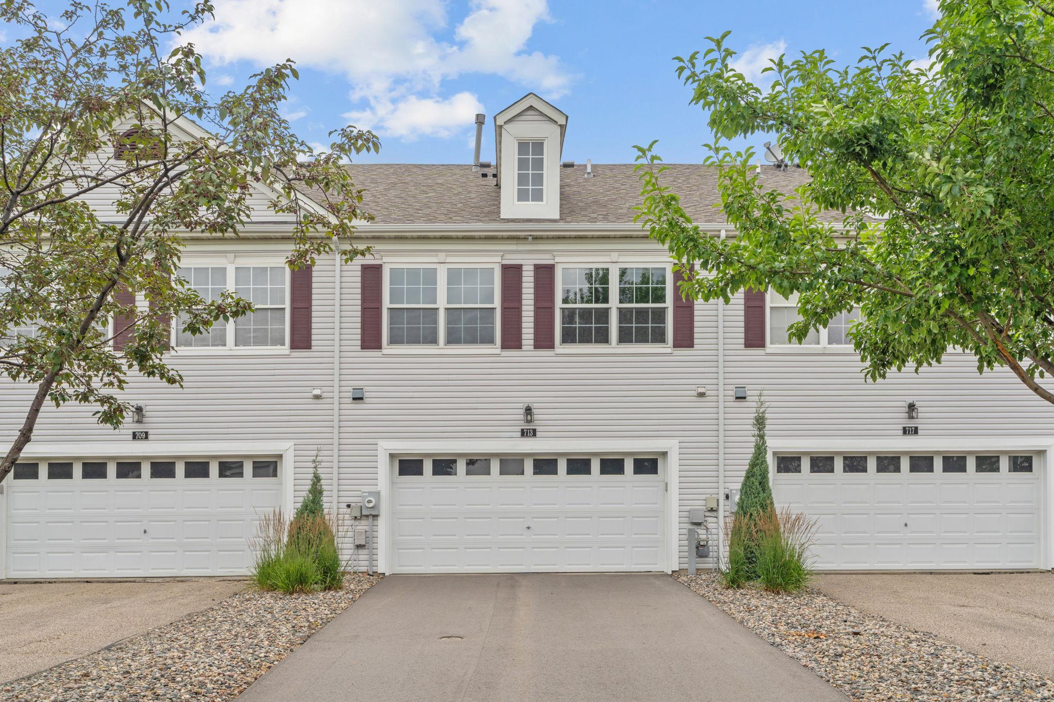 Two-car finished garage with electric heat! Newer driveway!
