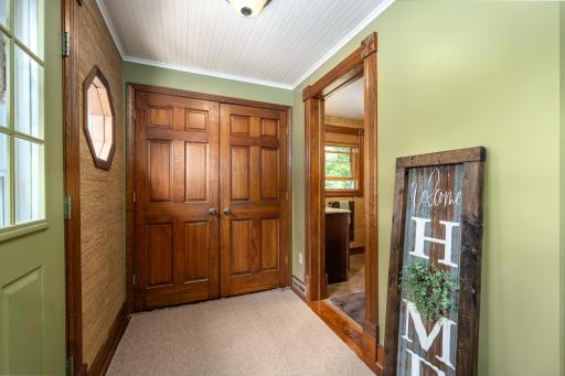 Beautiful solid wood doors on the foyer closet