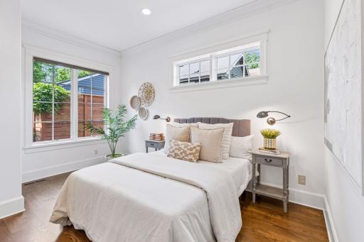 . The main-level primary suite features a full bathroom with soaking tub, walk-in shower, and spacious closet.