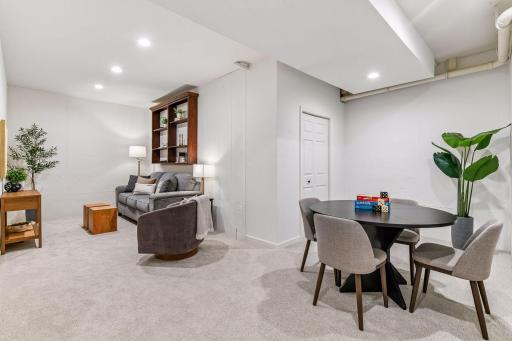 The finished lower level provides additional living space with a spacious family room, amusement room, two bedrooms, and full bathroom.