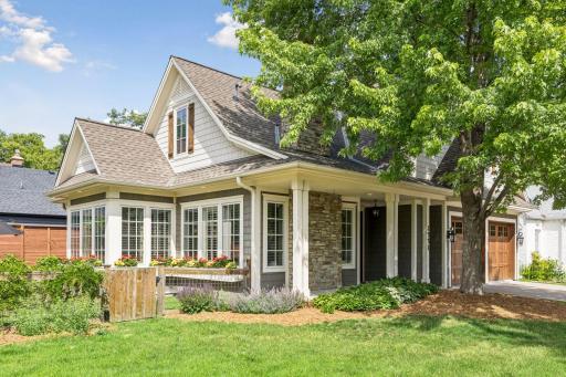 Outside, enjoy a welcoming front porch and the convenience of a two-car attached garage.