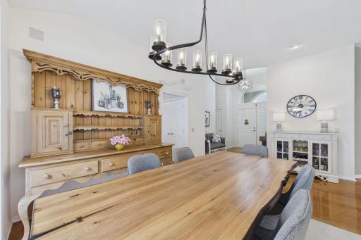 Dining Room so functional for parties, games. Notice Bar under the clock. Easy Living.