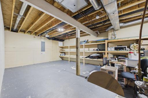 Bring all your treasures....there's plenty of storage in the lower level. Notice built in shelving to help keep things organized.