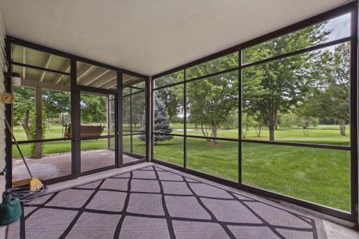 Spend your summer evenings reading & summer breezes in your screened in porch.