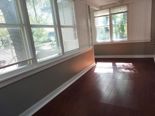 Drink your coffee on this lovely front porch and watch the neighborhood activity.