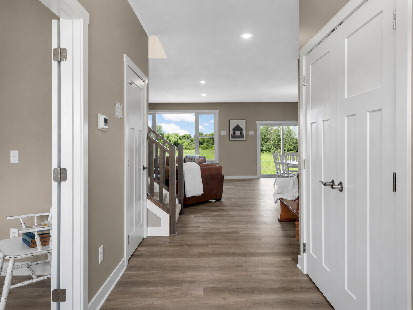 Entry Hall with plenty of Storage and Open Staircase