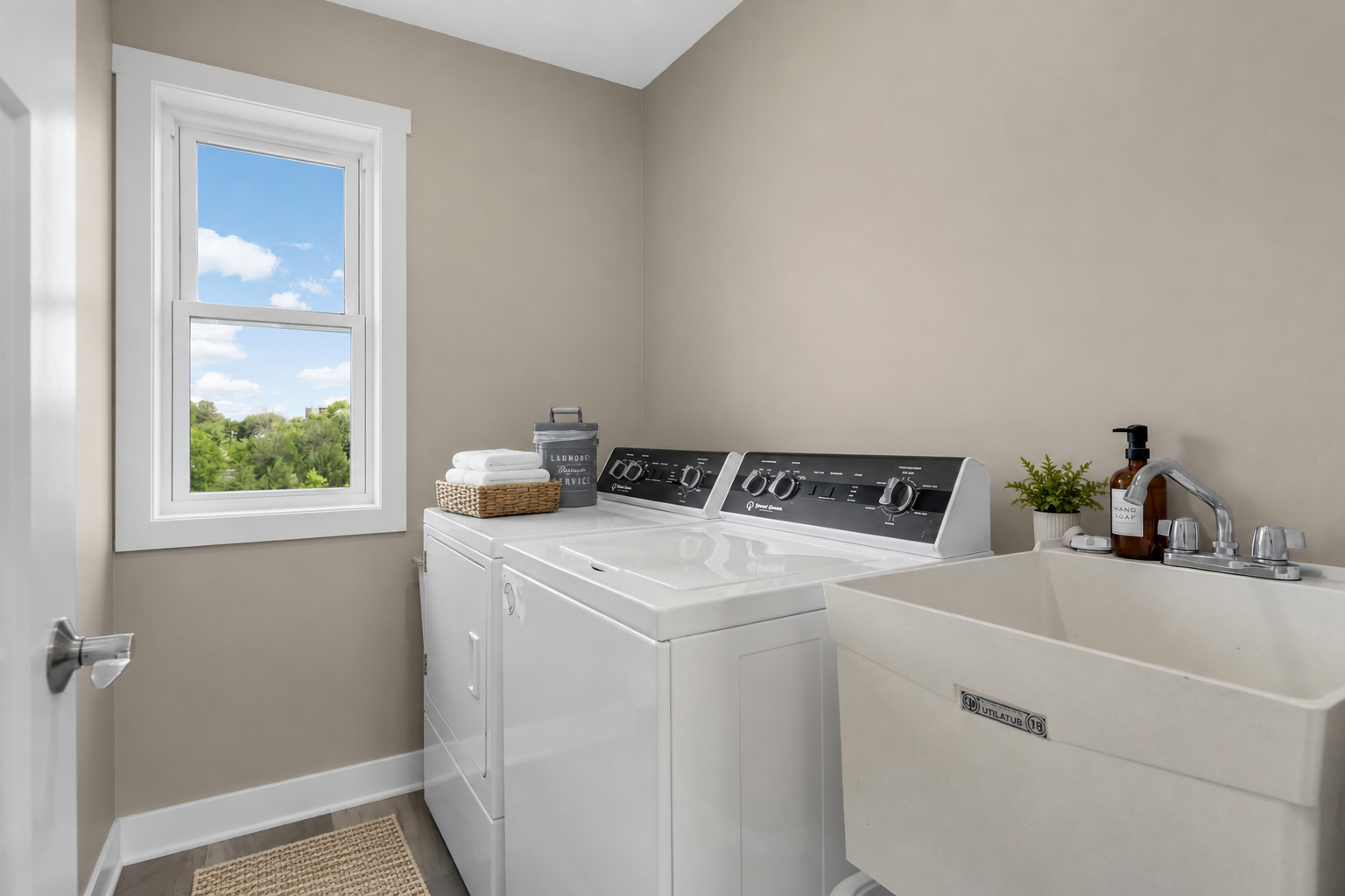 Convenient upstairs laundry keeps daily household tasks close to the bedrooms