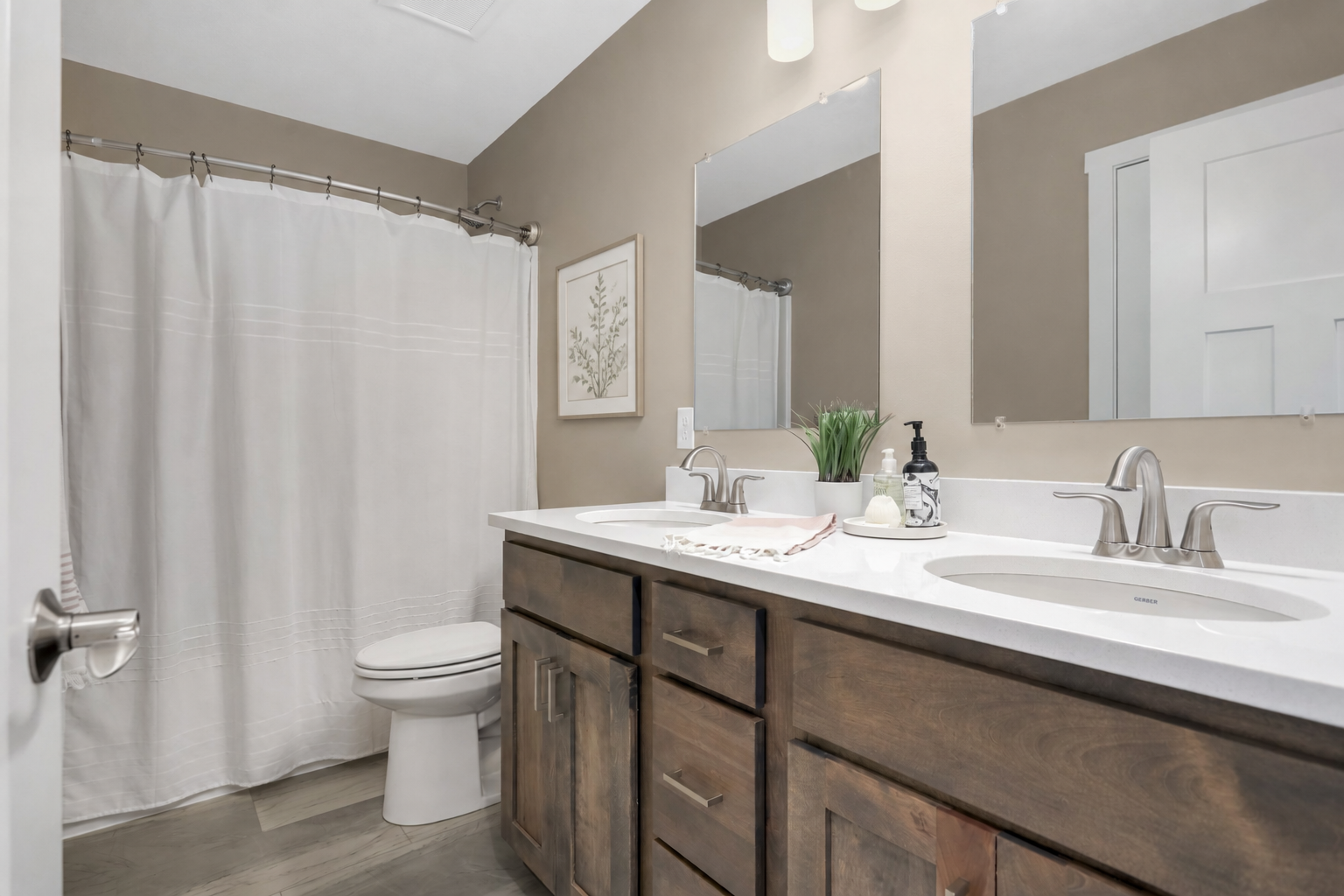 Full Bathroom with Tub and Double Vanity