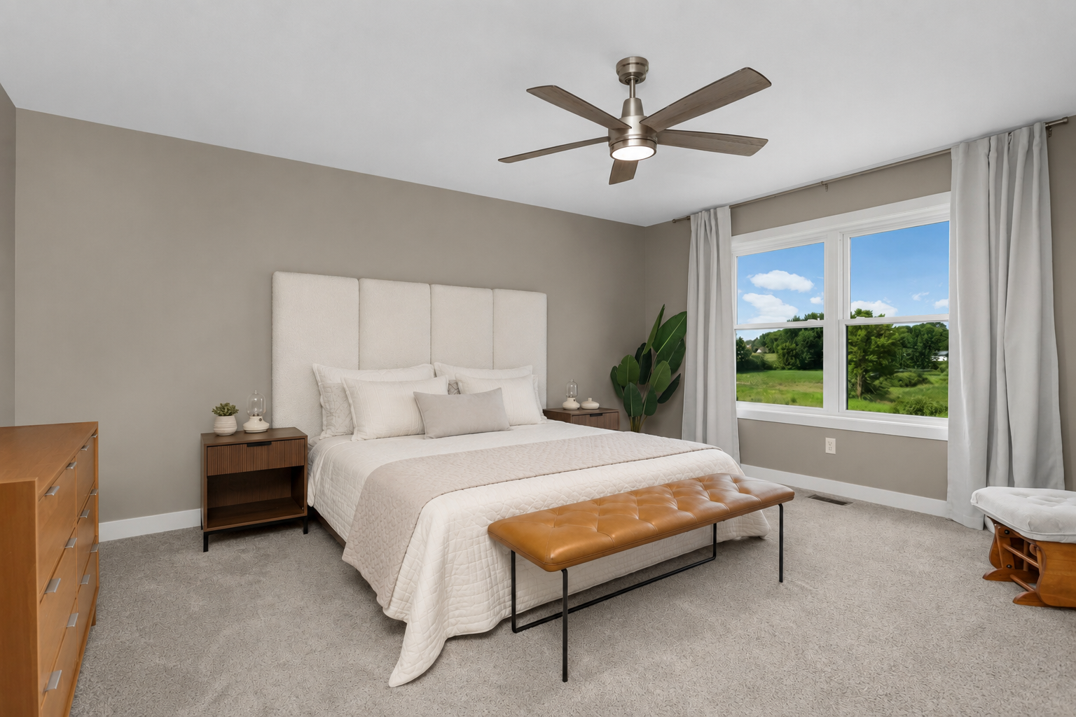 Spacious primary bedroom offers a comfortable and private retreat