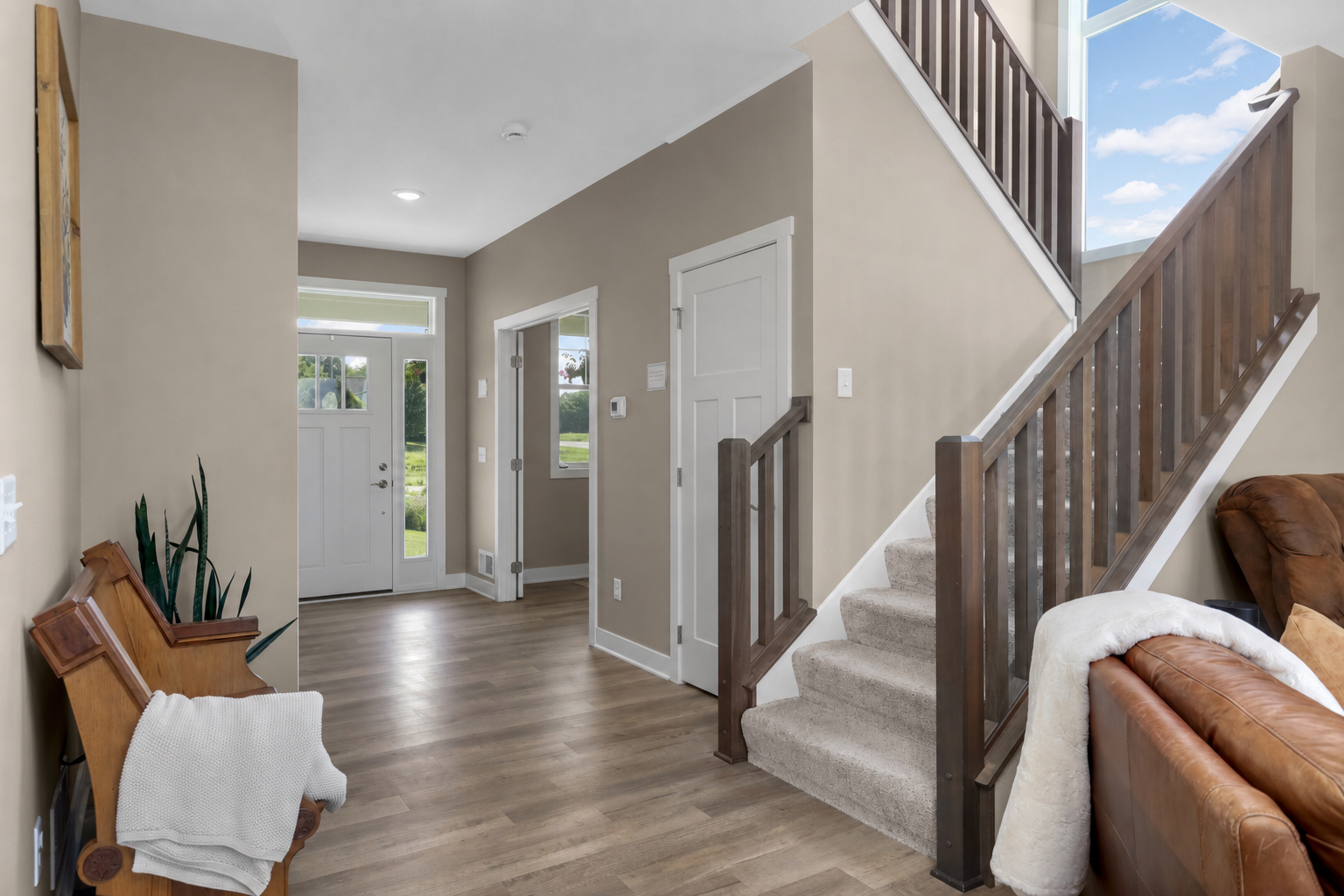 Entry Hall and Open Staircase