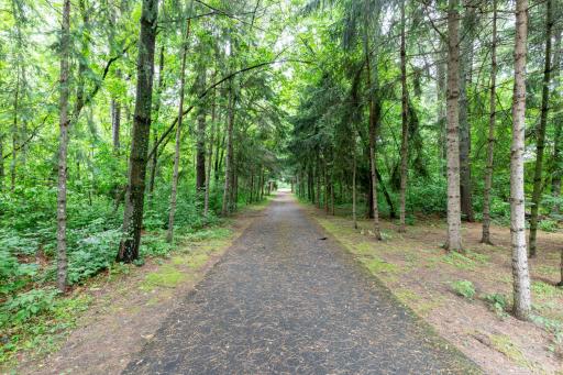 Long private driveway off of Sleepy Hollow Rd surrounded with woods for wonderful private retreat.