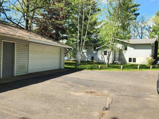 Great asphalt driveway space for guest parking for the summer gatherings at the lake!