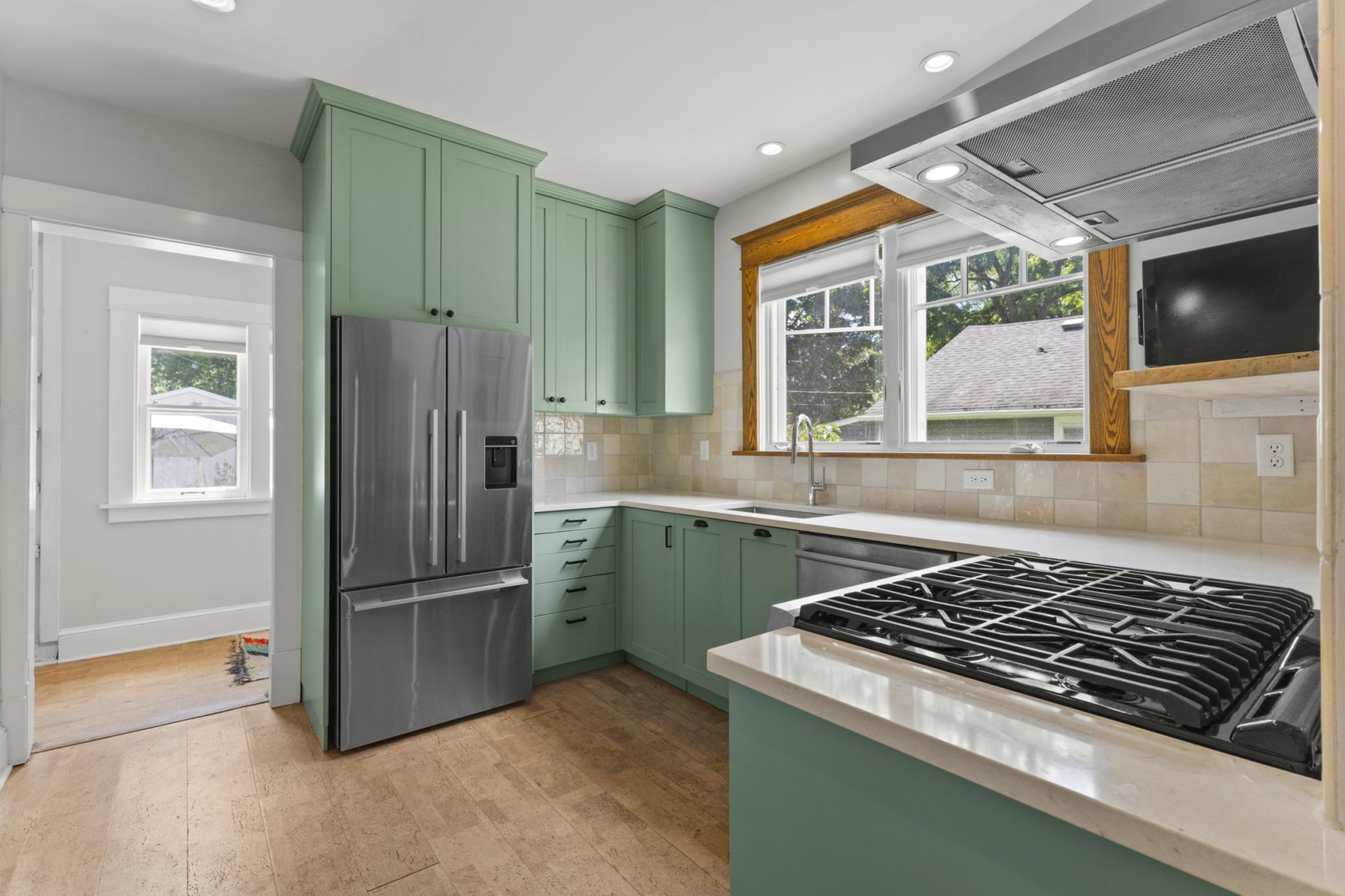 Another view of the beautiful kitchen, looking toward the mudroom/pantry area.