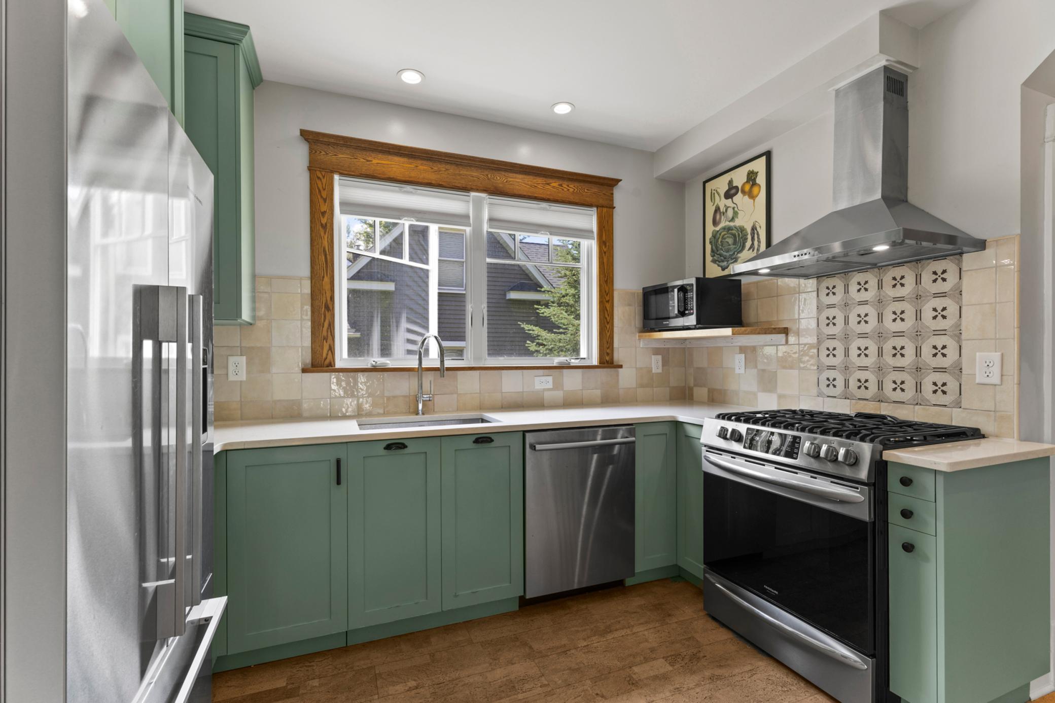Beautifully updated kitchen with large, west facing window.