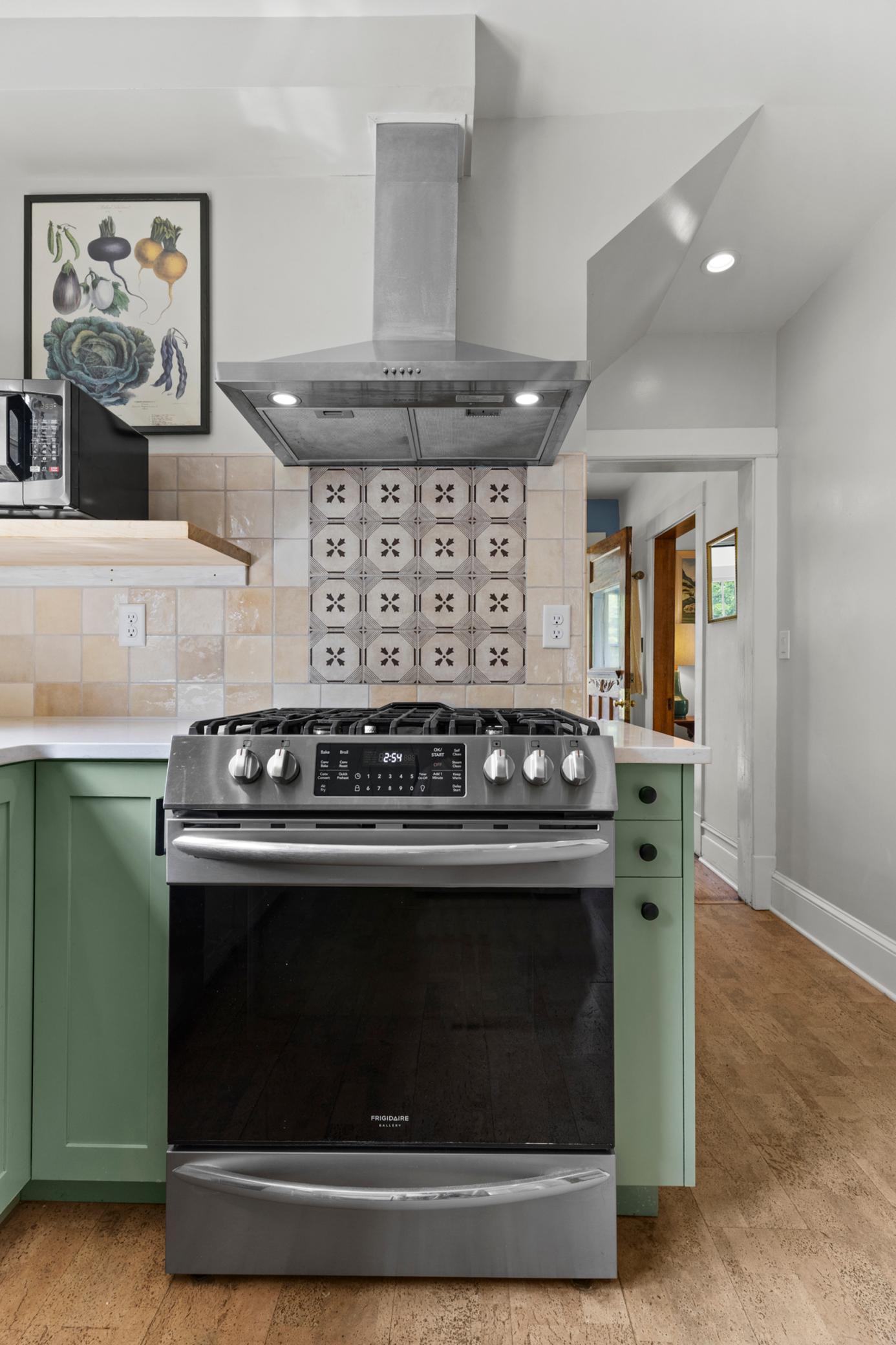 The cook will appreciate the gas range & vented range hood!