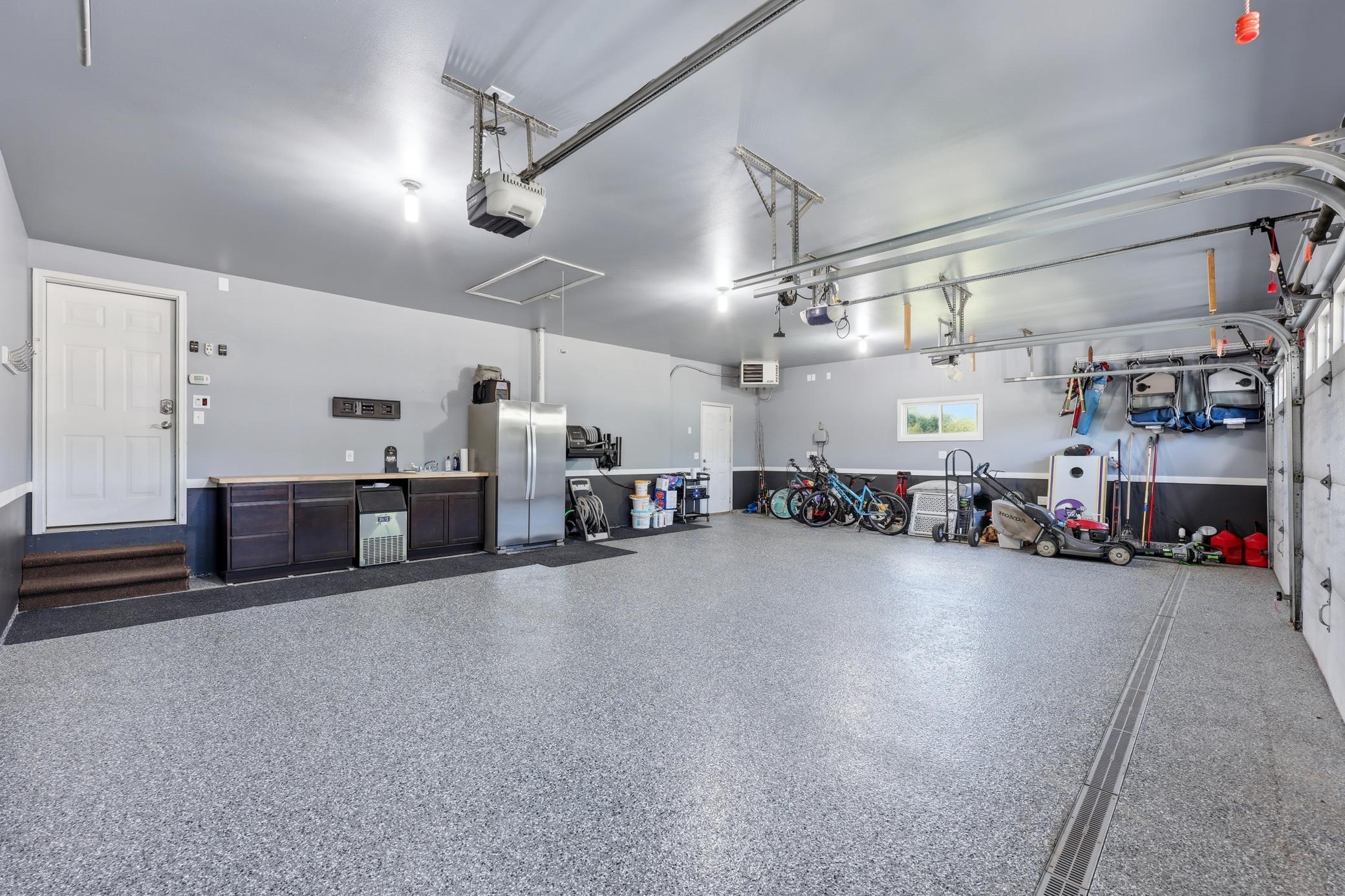Newly remodeled garage - full width floor drain