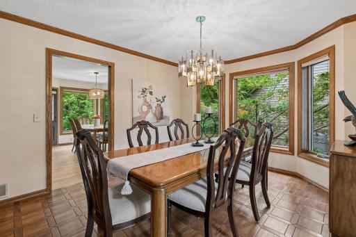 Formal dining naturally feeds to the heart of the kitchen and informal dining~