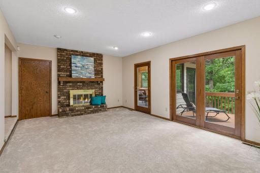 Enjoy the cozy family room~ The door enters into a massive office/study. It was also used as a bedroom, if you so desire!