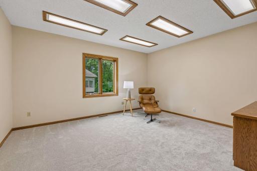 Tucked away office space or flex room. Close to the action, yet a quiet & private area~